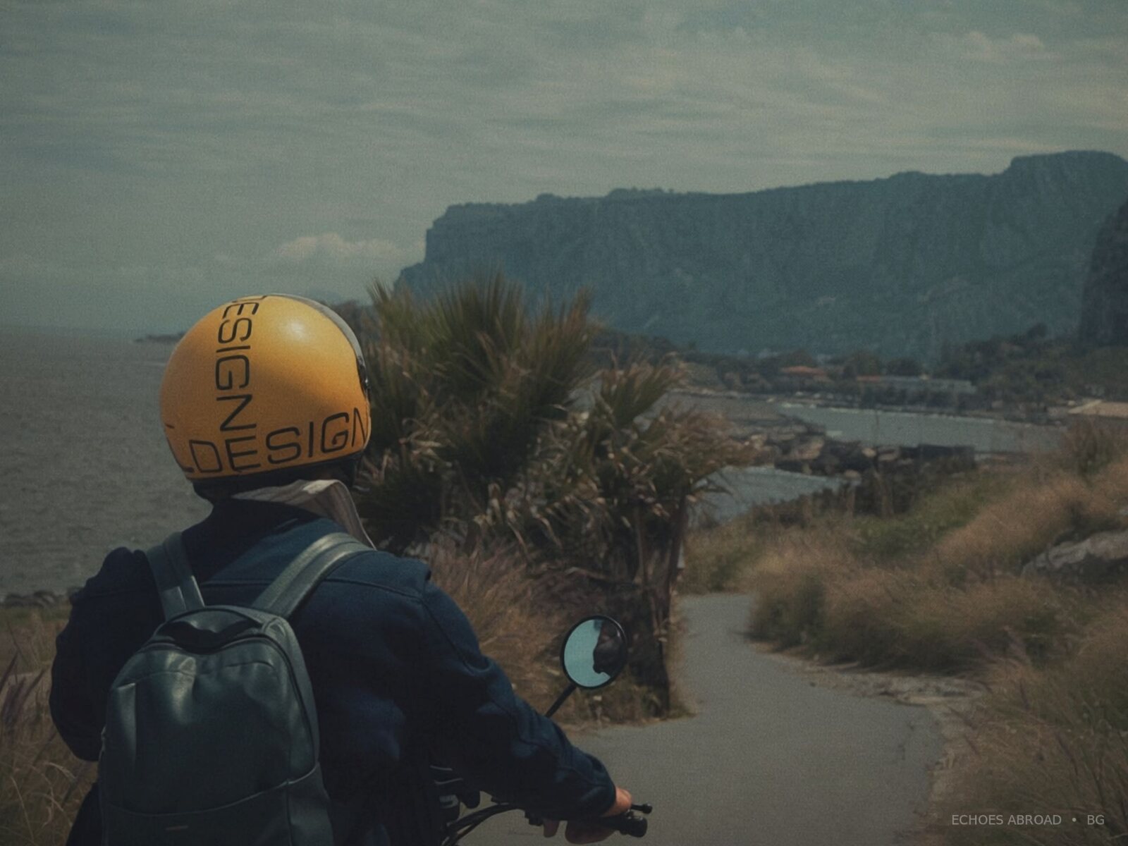 A traveler moving along a coastal road, ready for a new detour